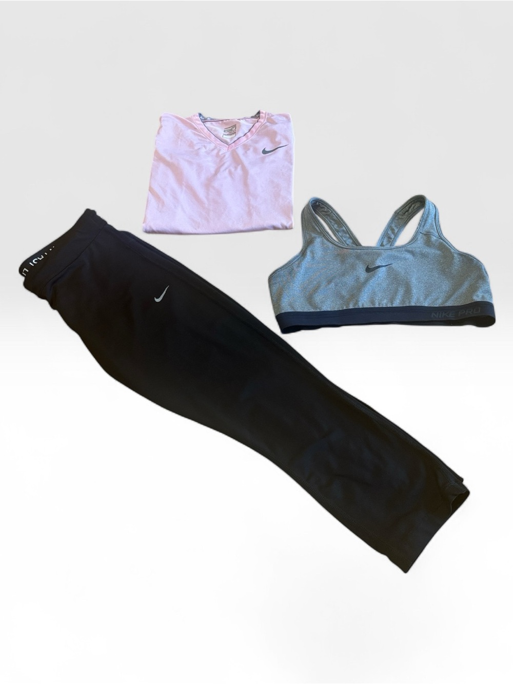 Nike medium three-piece women’s Pink Top, Gray Sports Bra & Black Leggings wear